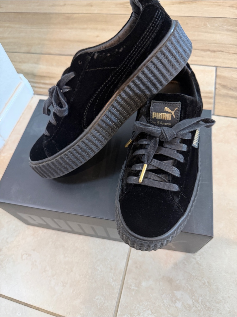 Puma Black Velvet Platform Sneakers with Gold Trim